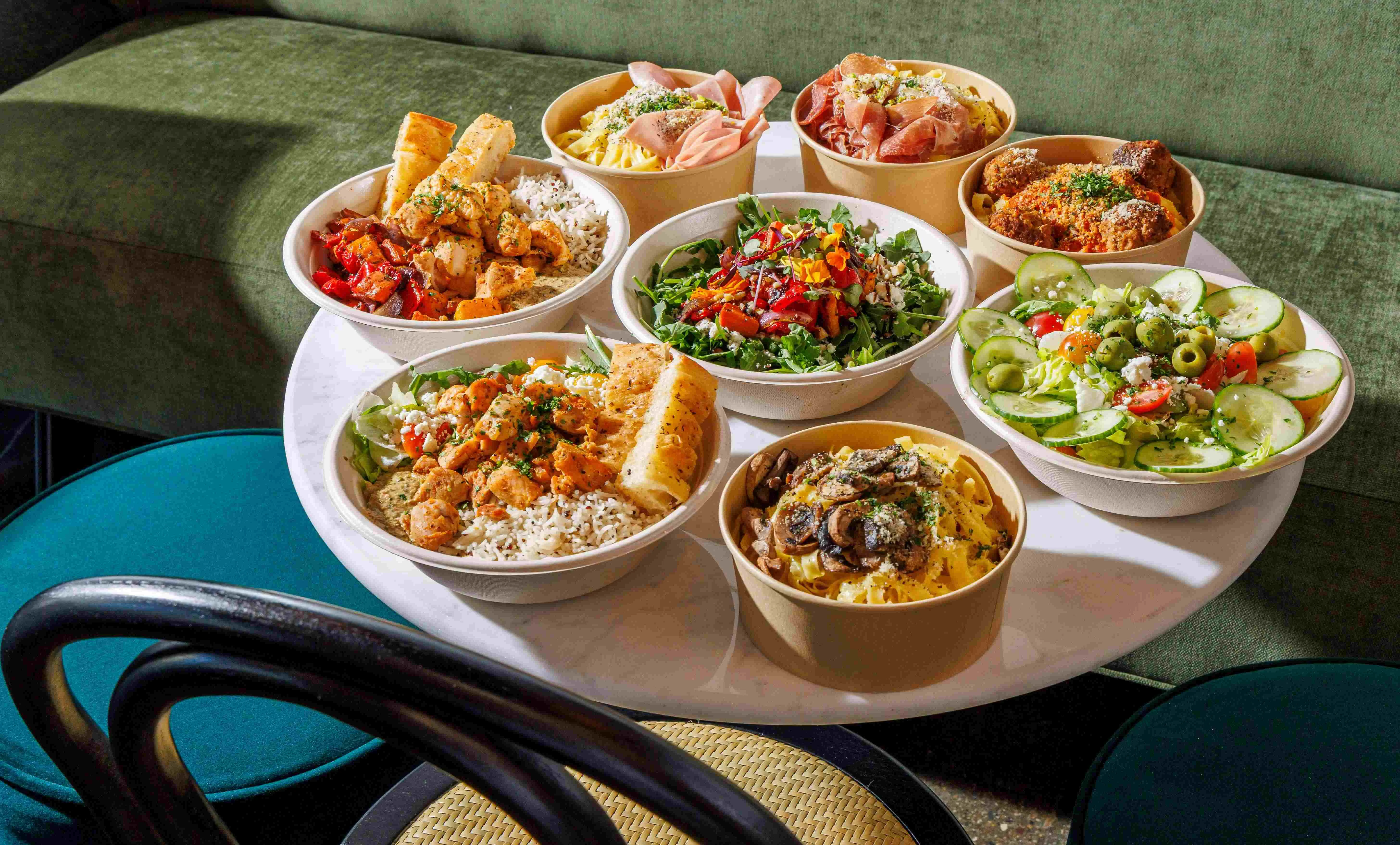 Assorted Mediterranean grain bowls with fresh ingredients