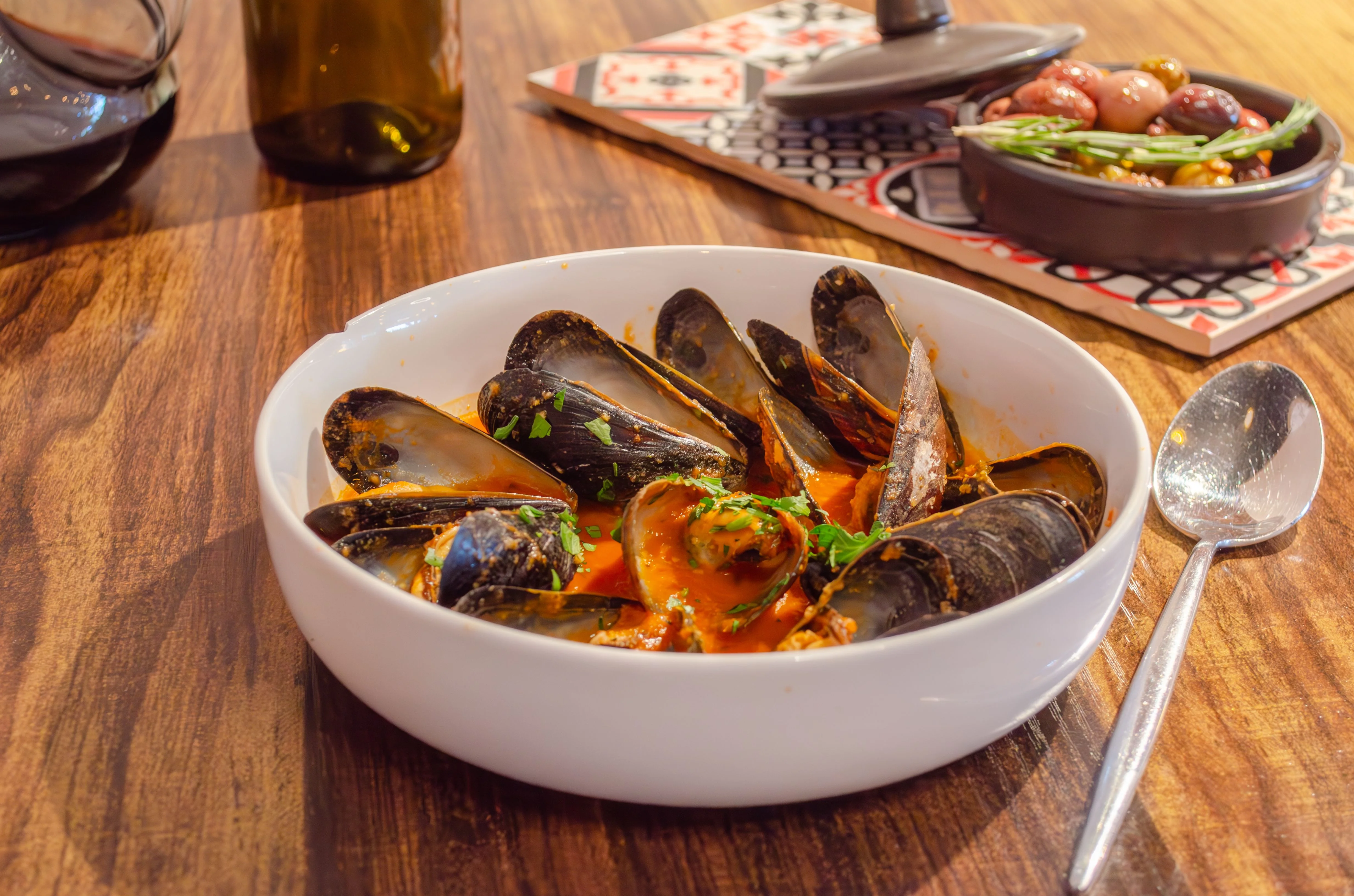 Delicious bowl of Mediterranean mussels in a savory tomato sauce