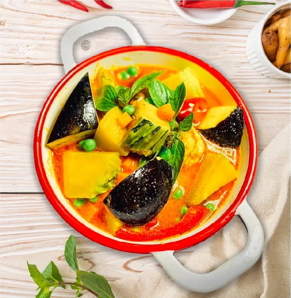 Thai green curry with vegetables in a vibrant bowl