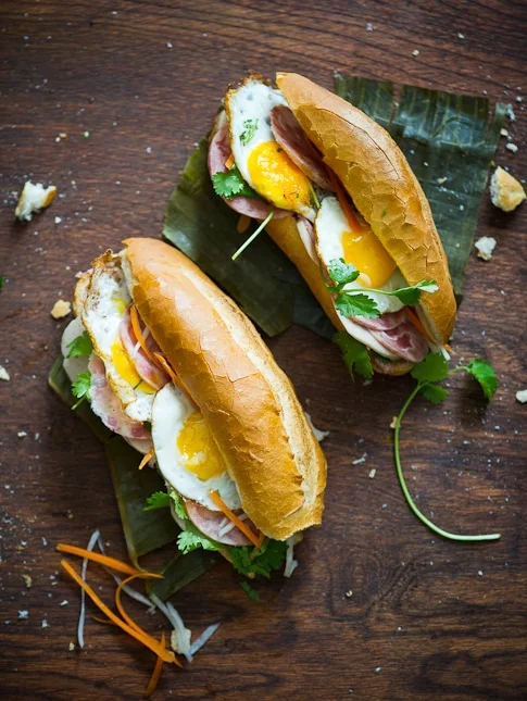 Vietnamese bánh mì sandwich with egg and herbs