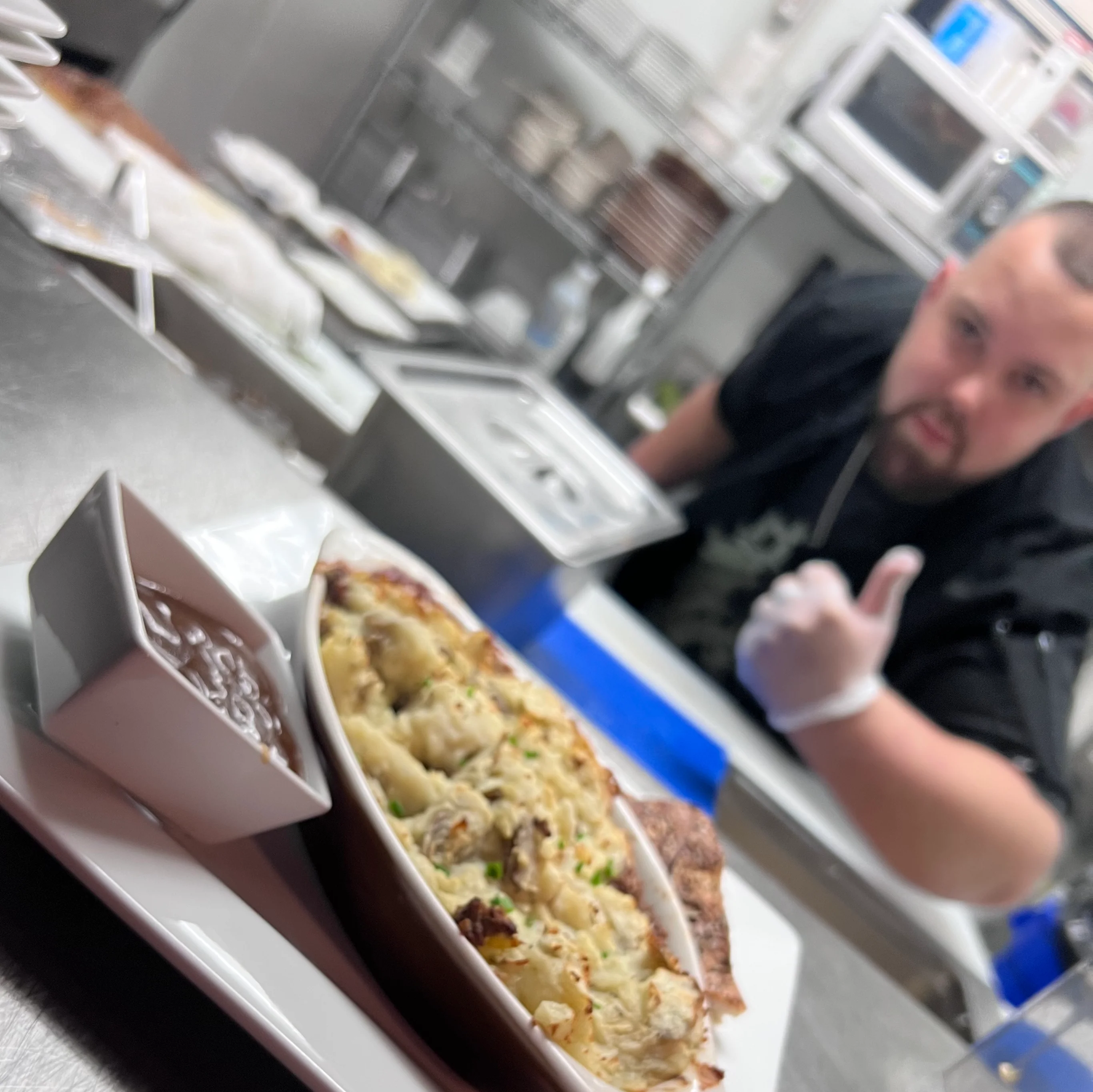 Baked seafood casserole in a restaurant kitchen
