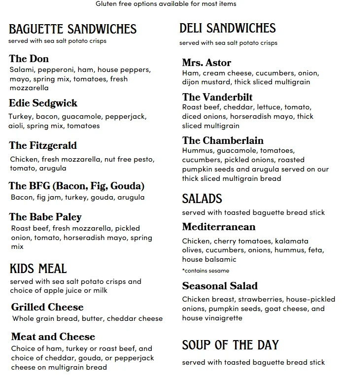 Menu featuring assorted sandwiches and salads in a casual dining setting