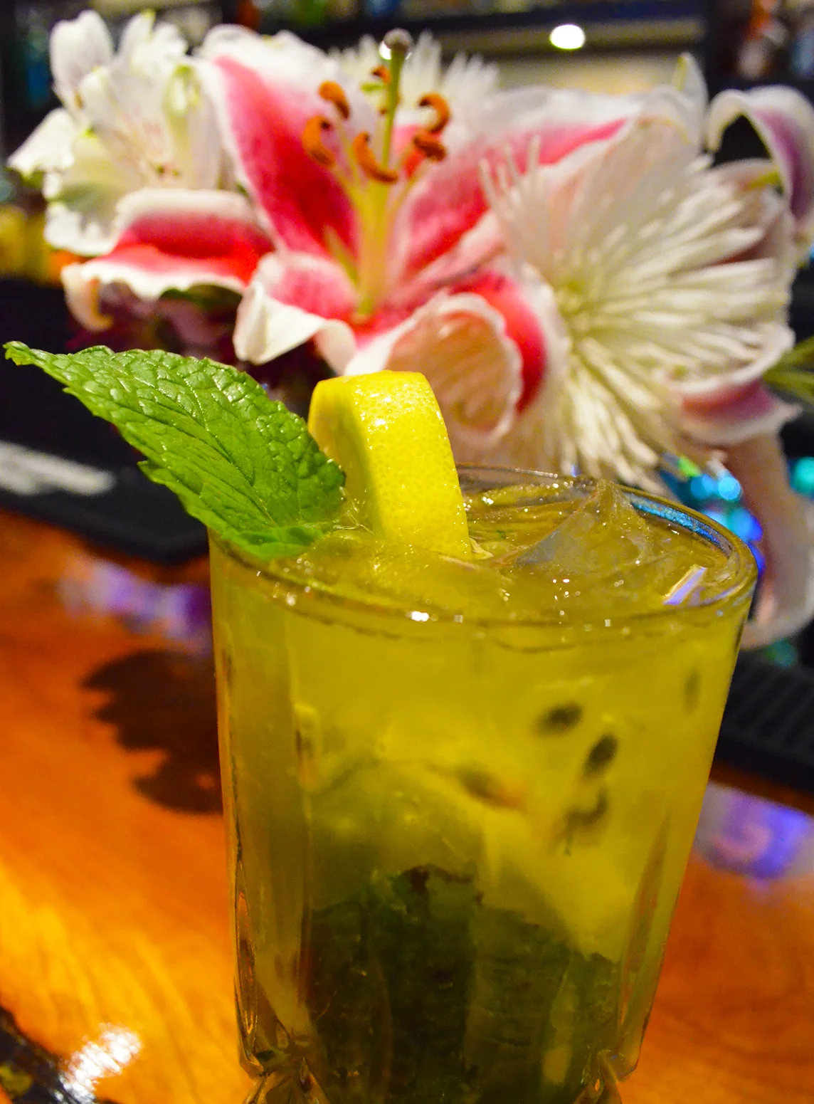 Refreshing mojito cocktail with mint and lemon garnish