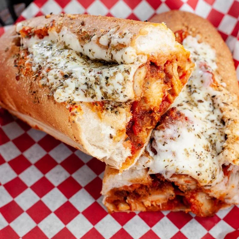 Italian chicken parmesan sub sandwich with melted cheese