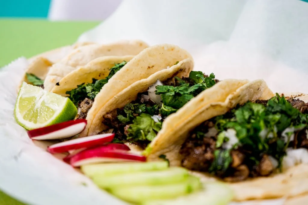 Authentic Mexican street tacos with cilantro and lime