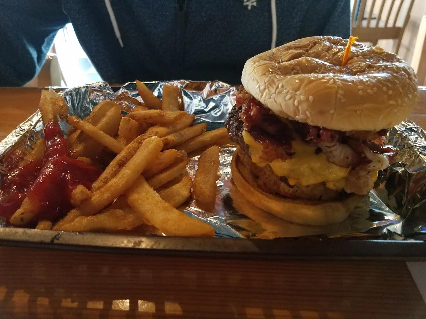 Loaded BBQ chicken burger with fries