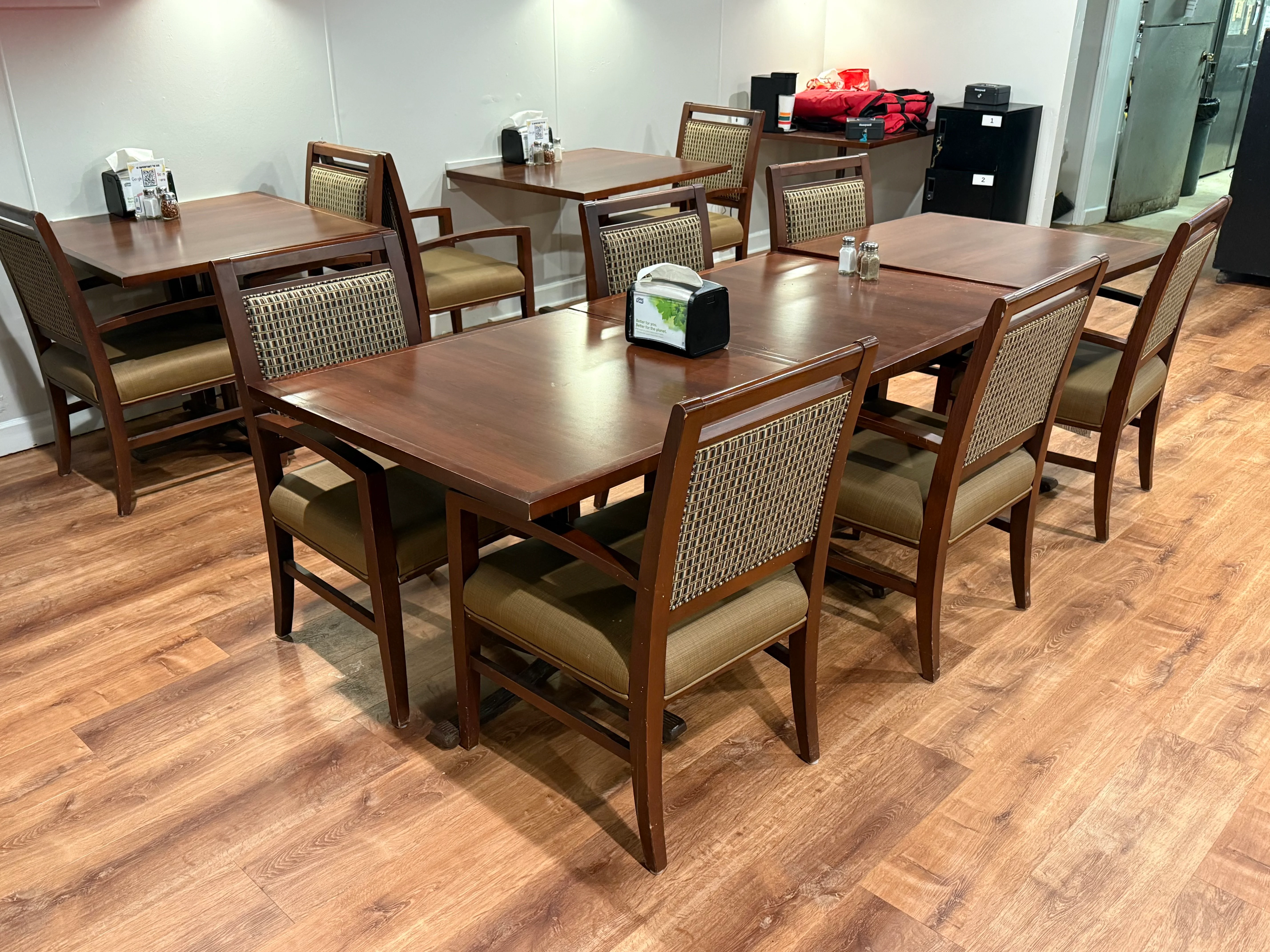 Cozy restaurant dining area with wooden tables and chairs