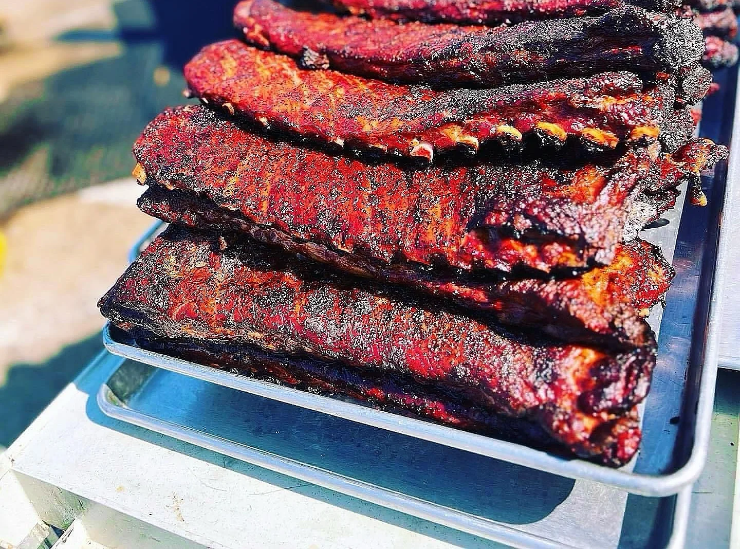 Smoked barbecue ribs on a serving tray