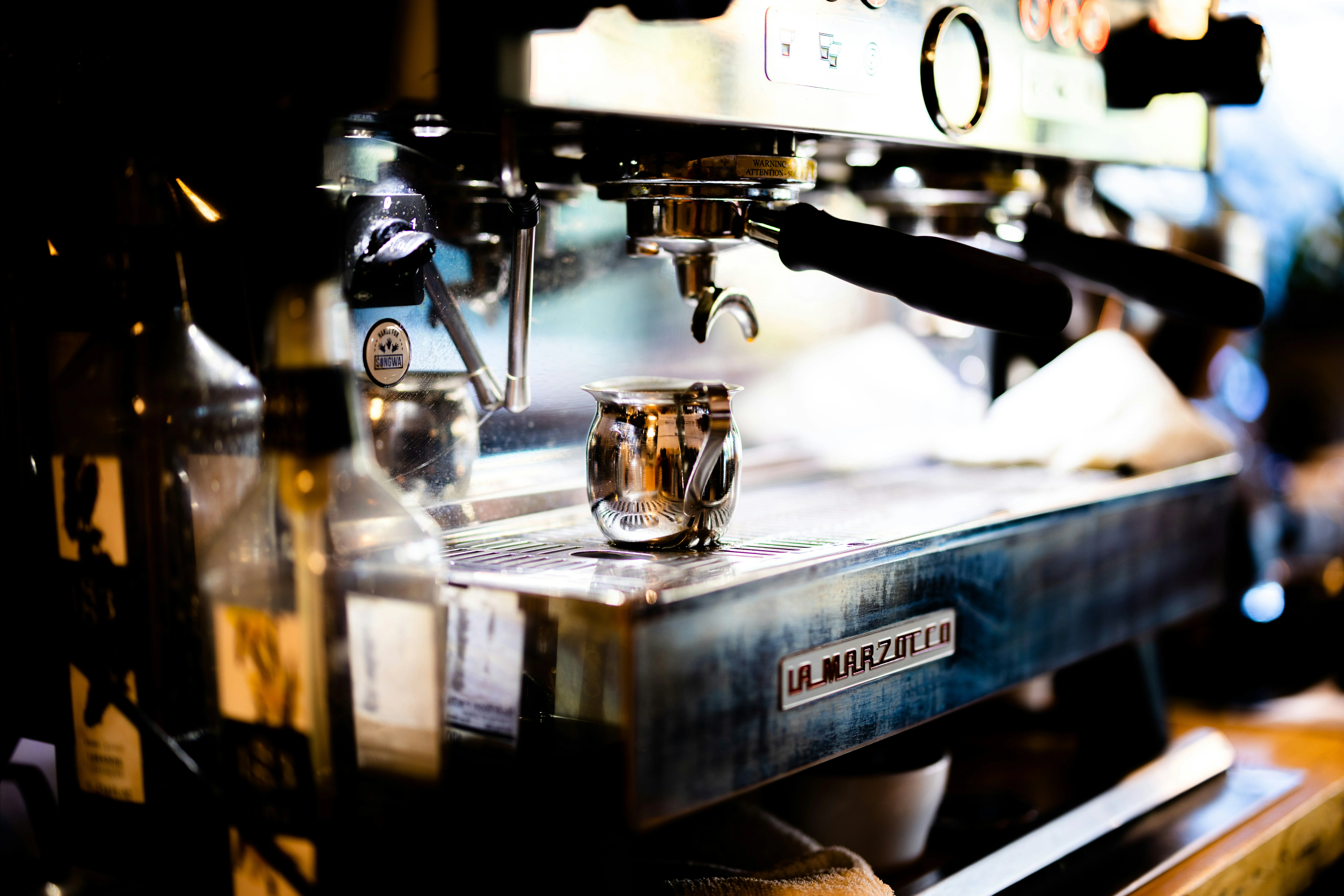 Espresso machine with a stainless steel milk pitcher