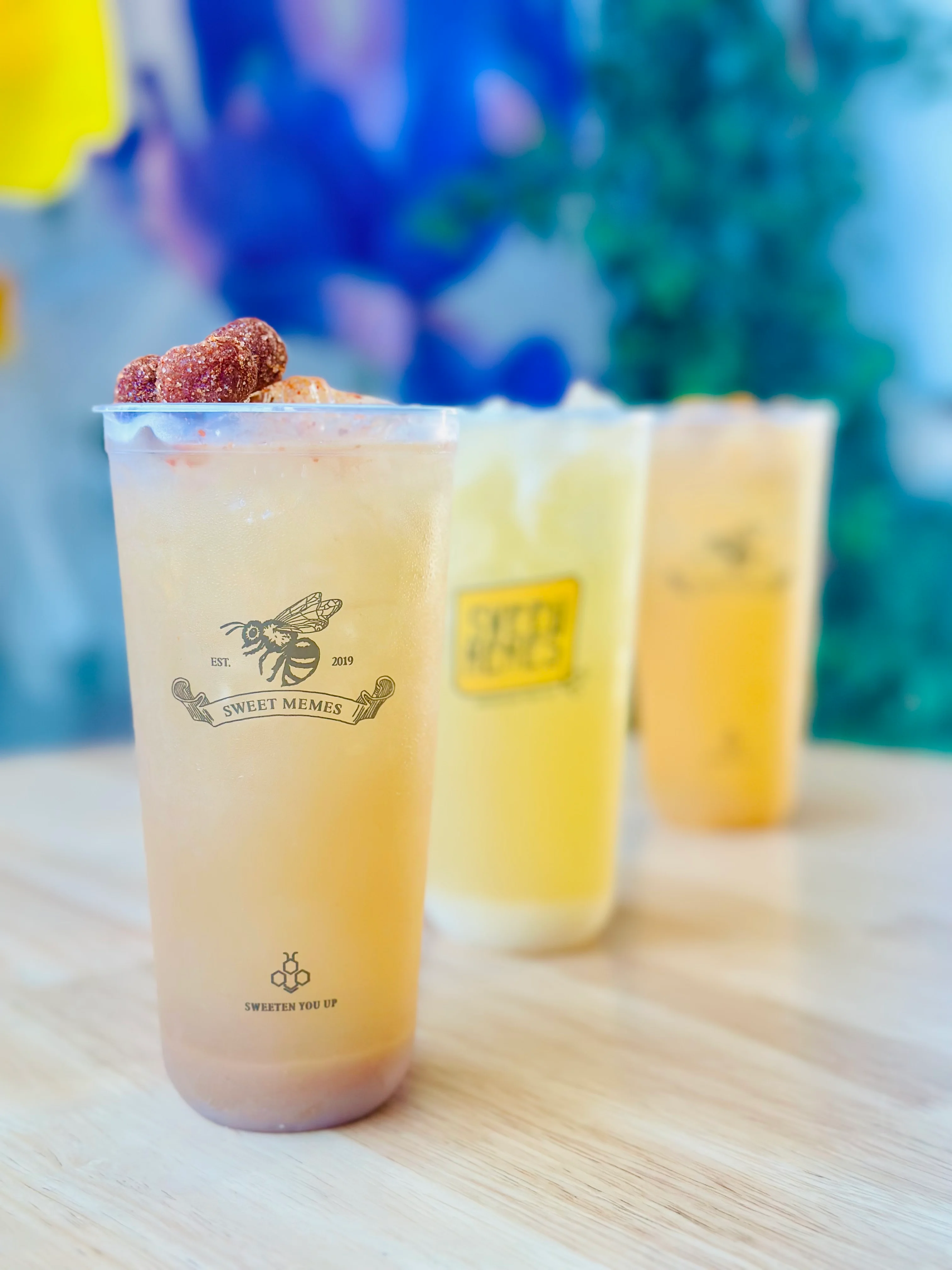 Refreshing fruit-infused beverages in clear cups