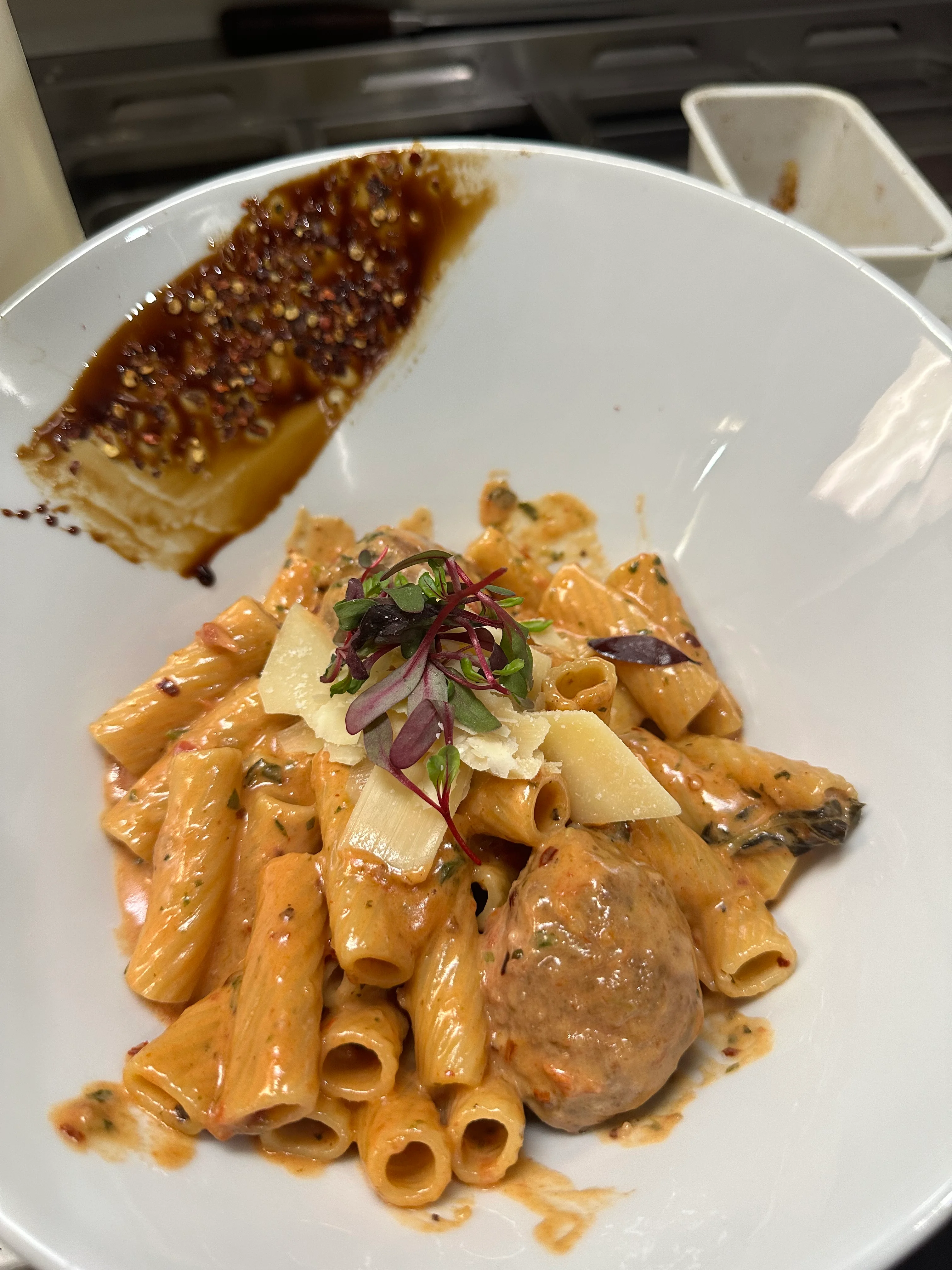 Creamy Italian rigatoni pasta with meatball