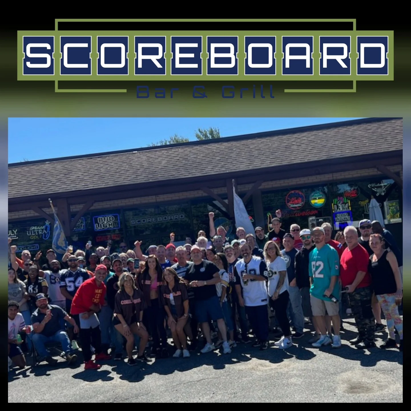 Crowd gathered outside Scoreboard Bar & Grill for a lively event