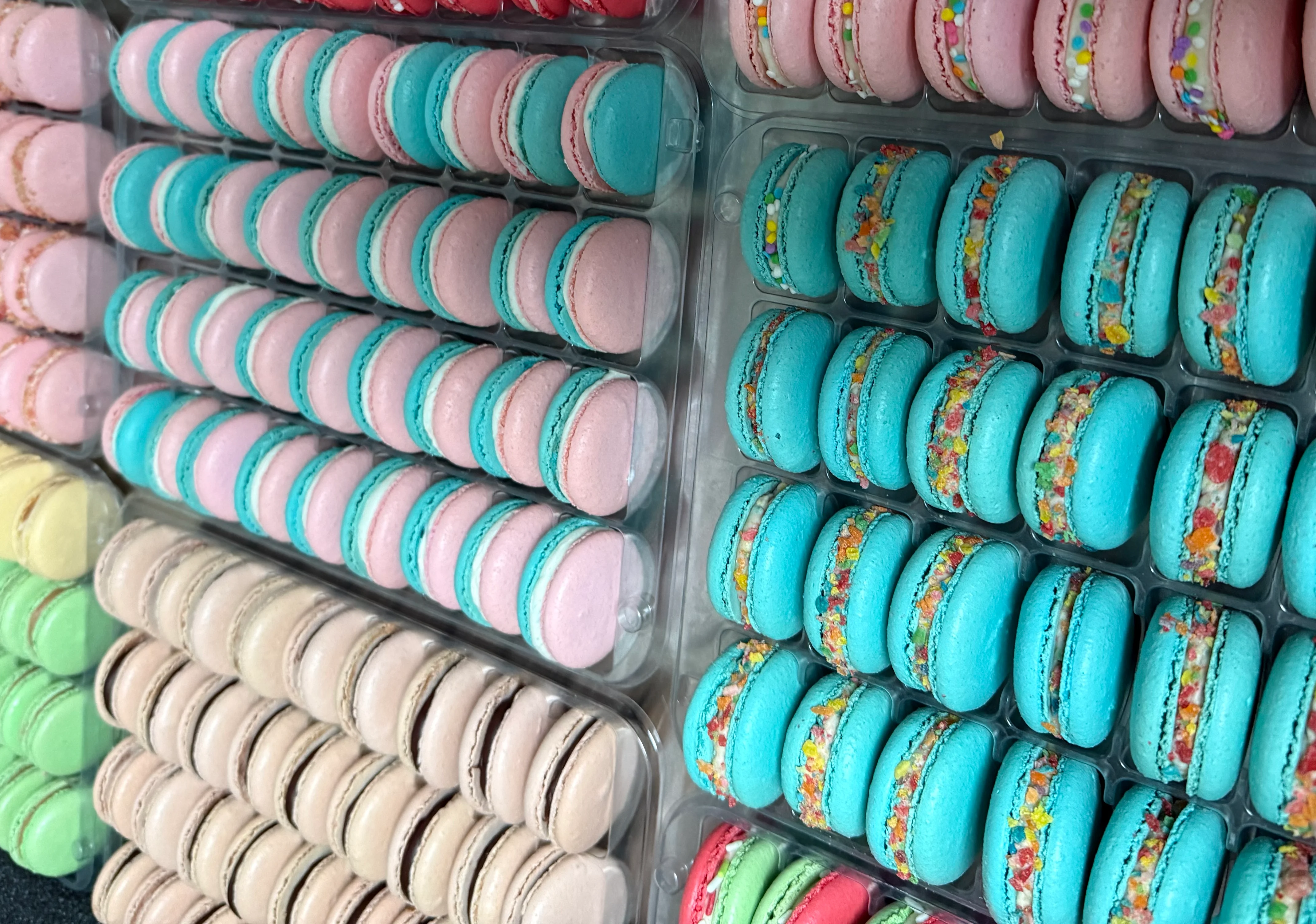 Colorful assortment of French macarons in various flavors