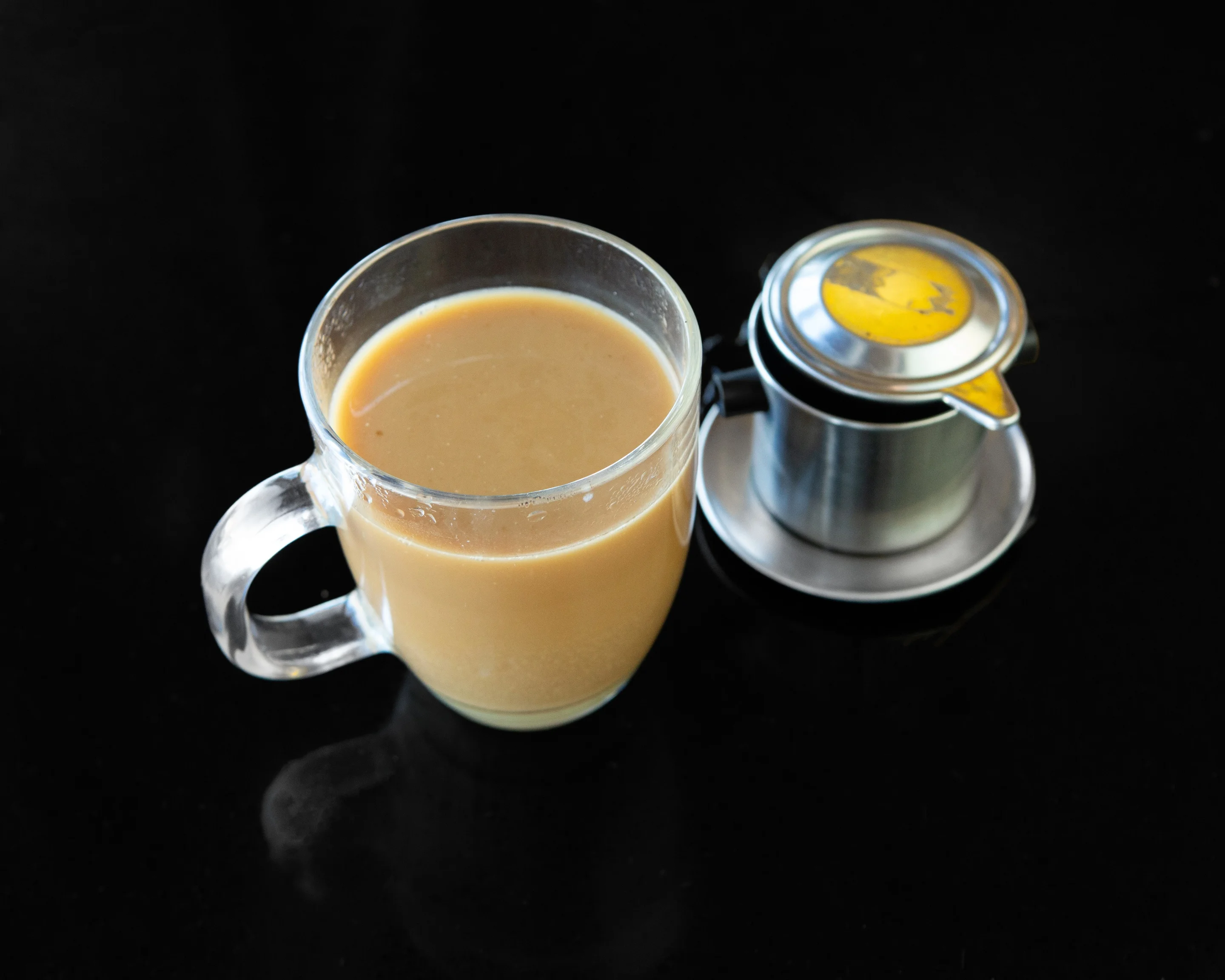 Traditional Indian chai served in a glass cup