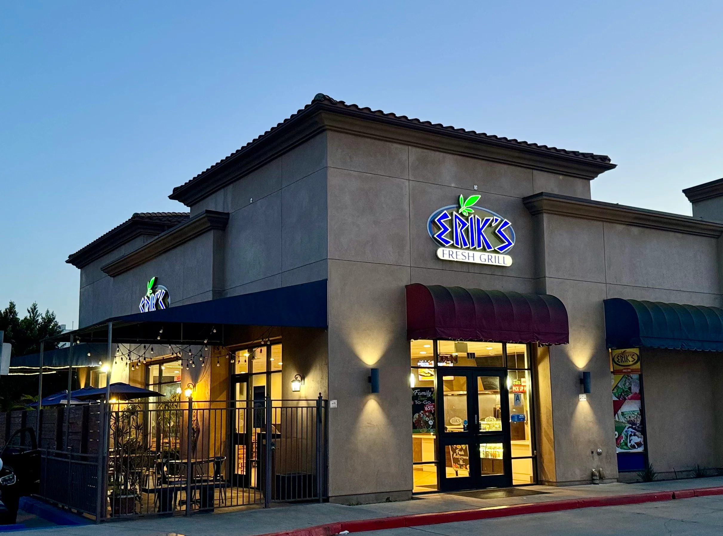 Exterior view of Erik's Fresh Grill at dusk