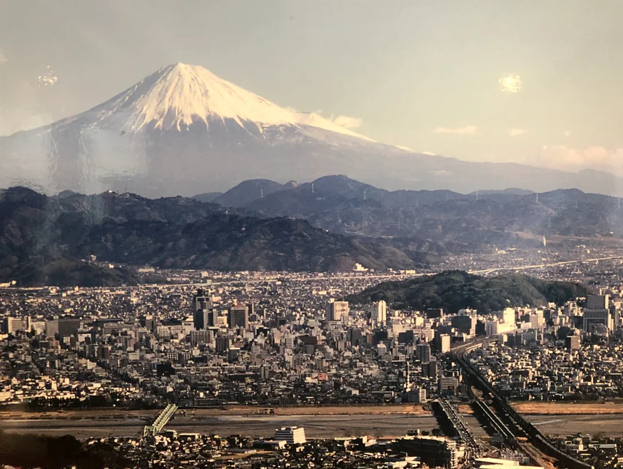 Panoramic view of Mount Fuji over a cityscape
