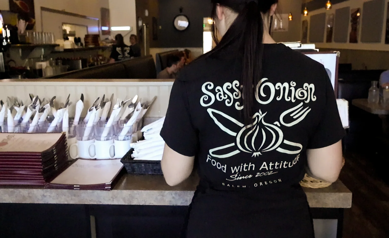 A restaurant chef preparing a dish