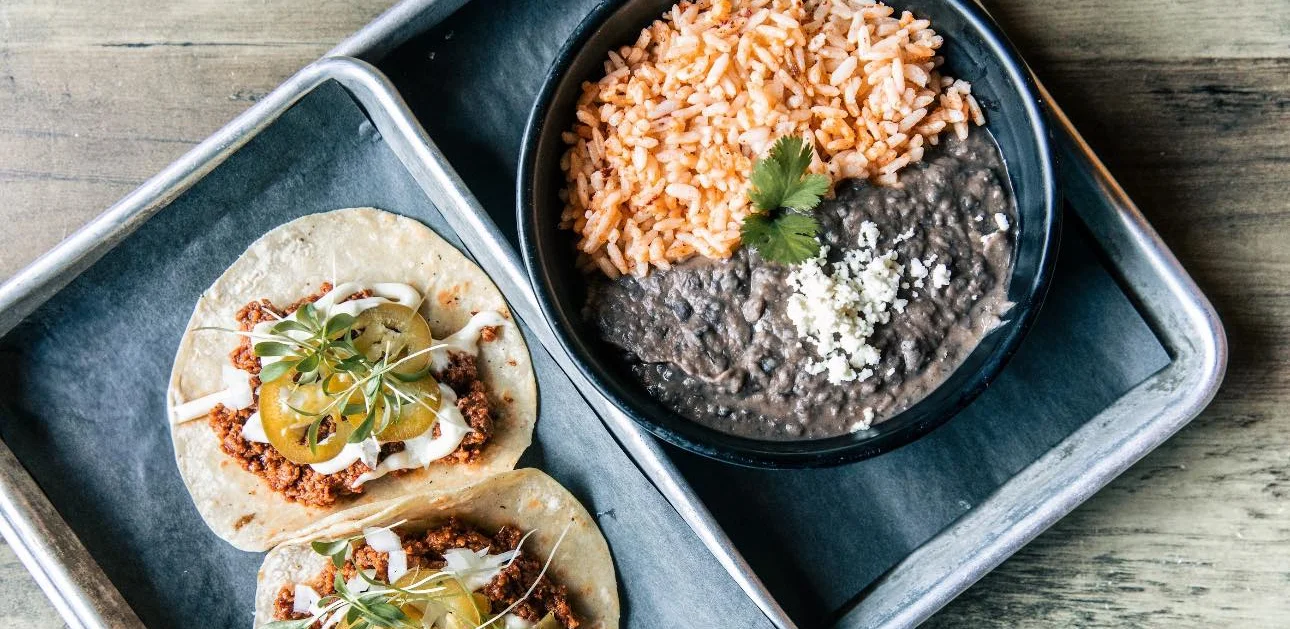 Mexican tacos with black beans and Mexican rice