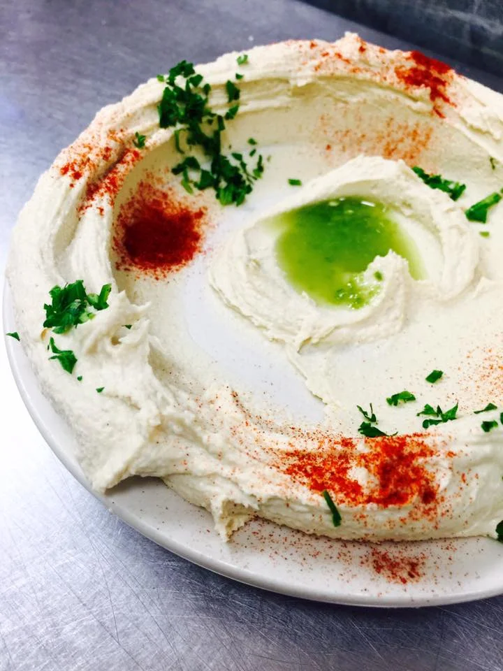Creamy Mediterranean hummus drizzled with olive oil
