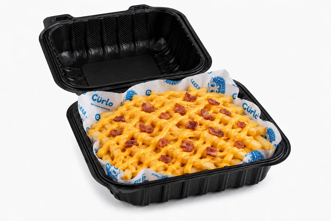 A takeout container filled with cheesy waffle fries topped with bits of bacon.