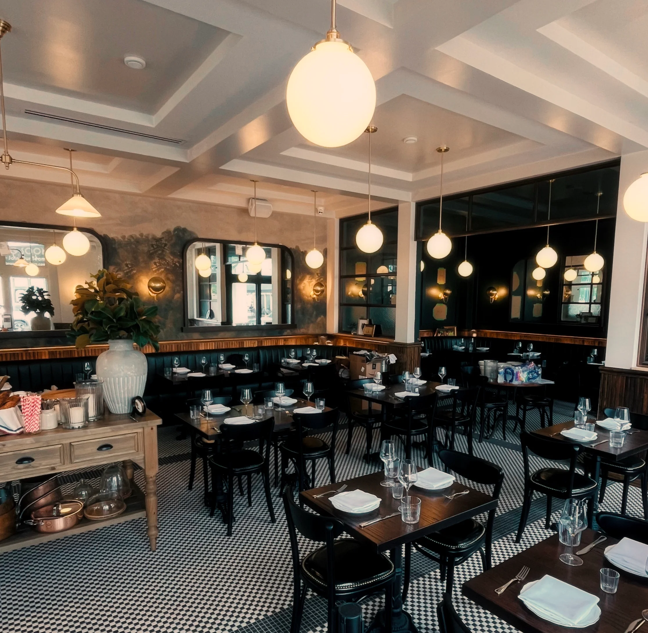 Charming restaurant interior with elegant lighting and cozy seating