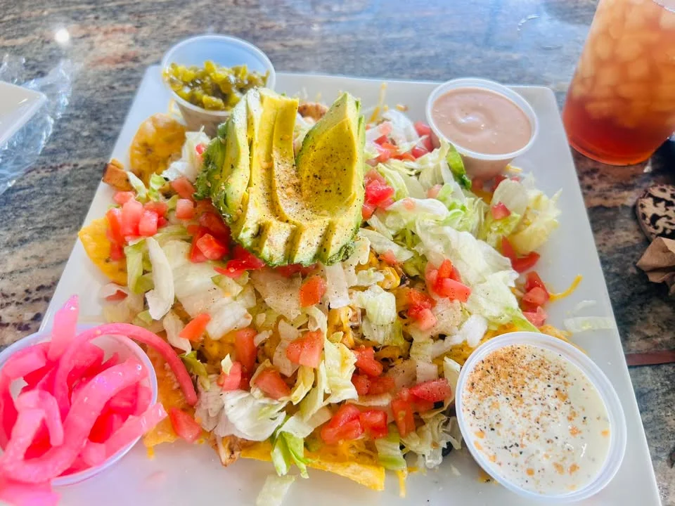 Colorful Mexican taco salad with avocado and toppings
