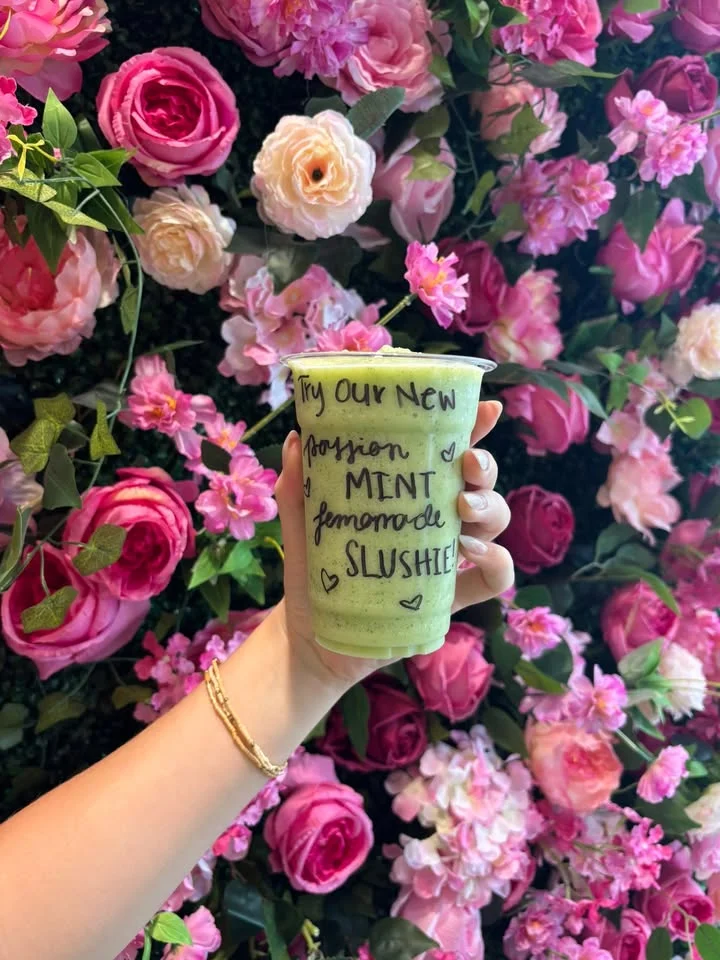 Refreshing mint lemonade slushie in a floral setting