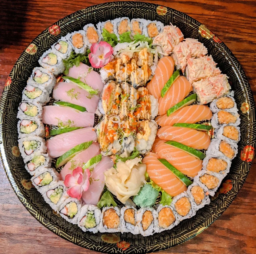 Assorted Japanese sushi platter with fresh sashimi and rolls