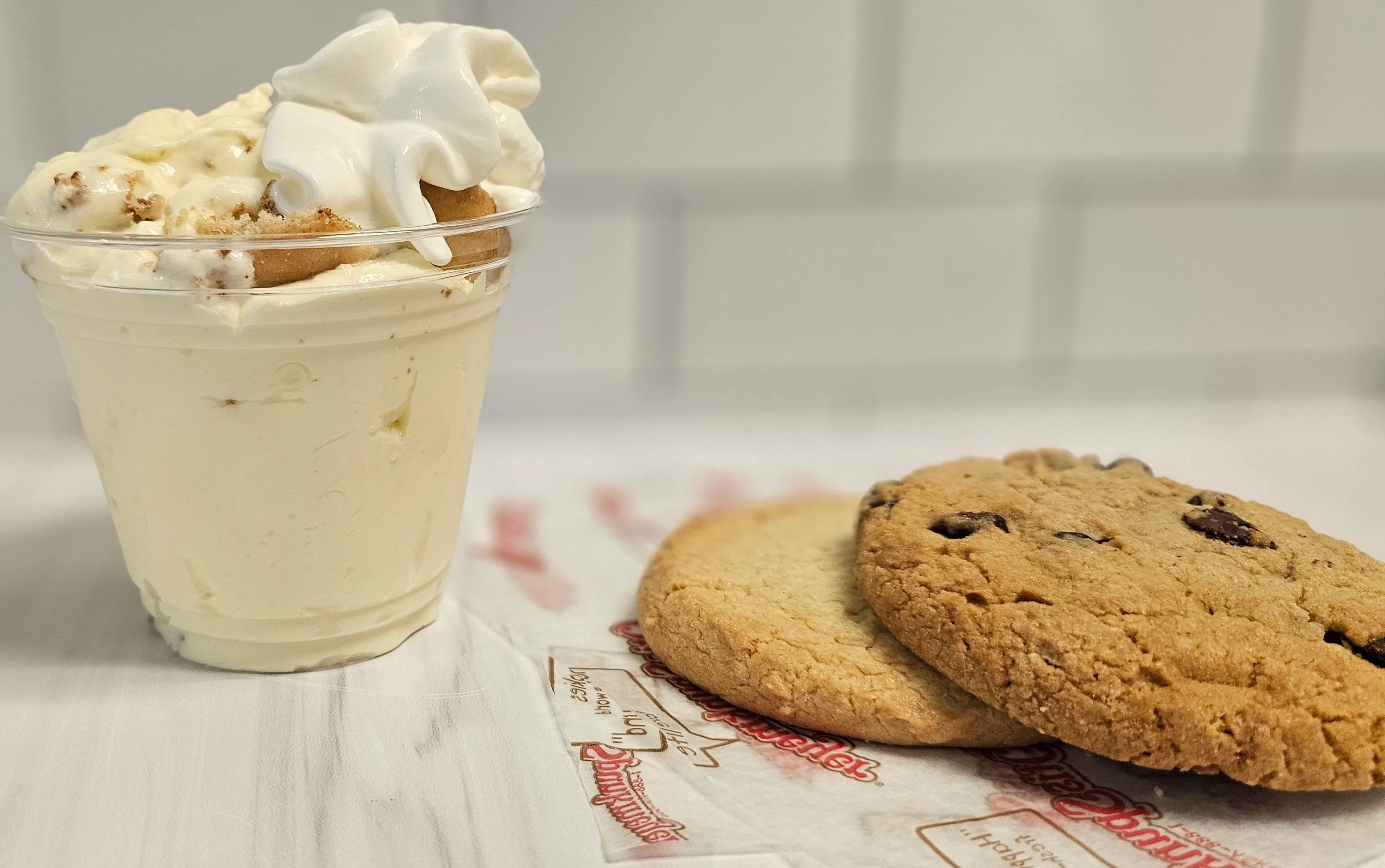 Creamy vanilla milkshake topped with whipped cream