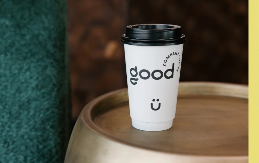 Cozy coffee shop interior with modern decor and barista station