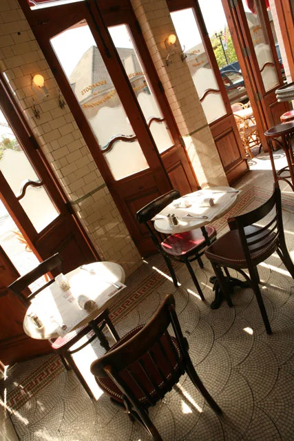 Charming restaurant interior with wooden furniture and natural light
