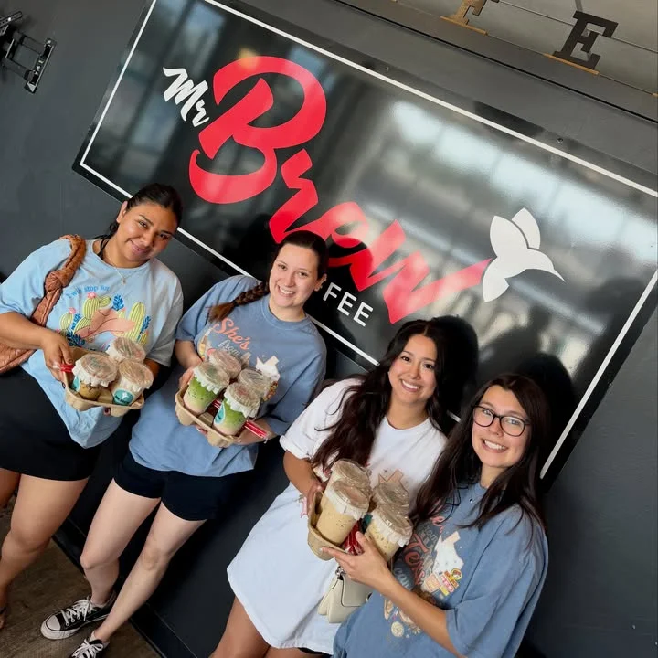 Group of friends enjoying coffee at Mr. Brew Coffee