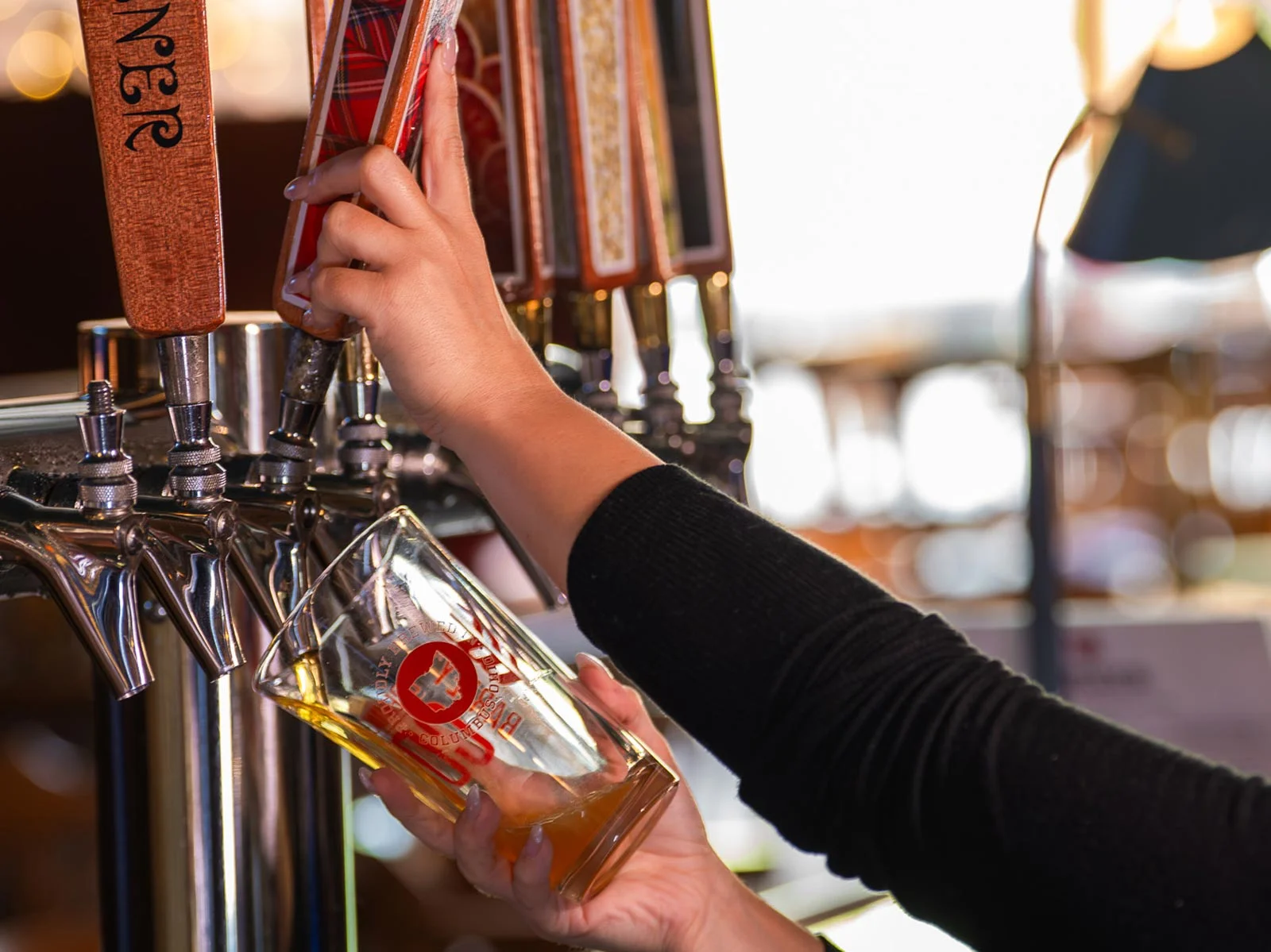 Pouring a house-brewed beer from a Barley's tap in Columbus, Ohio