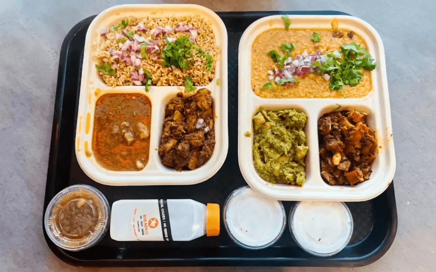 Indian thali with various curries and rice
