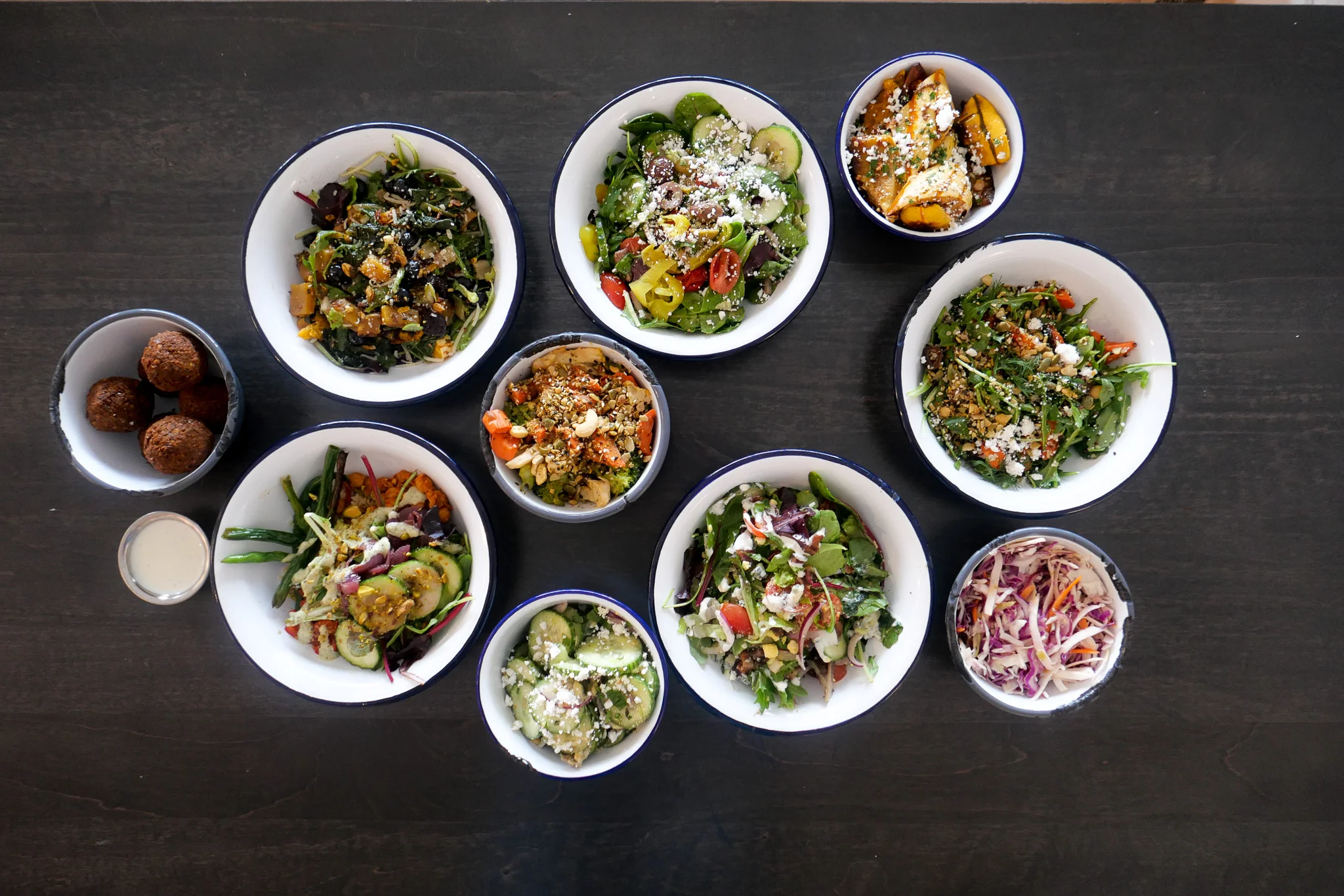 Colorful Mediterranean salad bowls with falafel