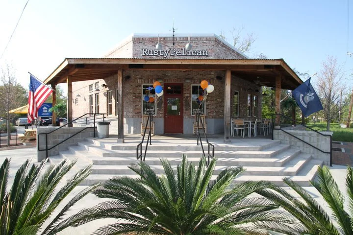 Exterior view of Rusty Pelican restaurant with festive decorations