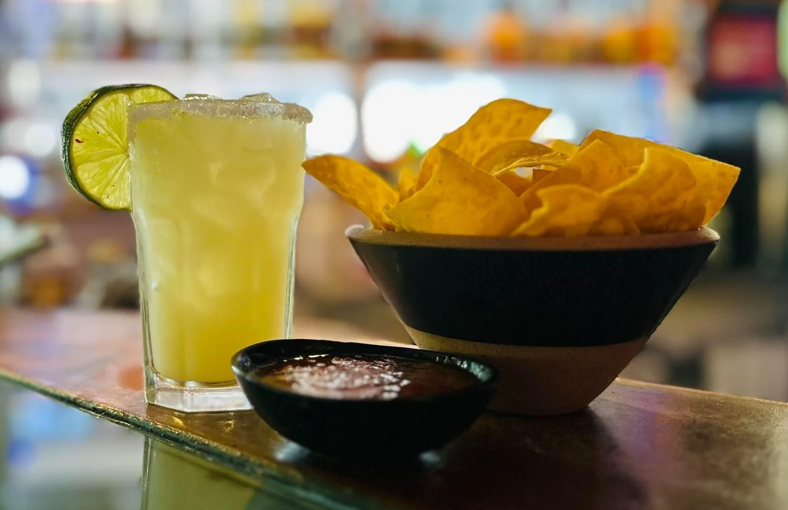 Aztec on Broadway Mexican Restaurant Portland - Margarita with tortilla chips and salsa at the bar