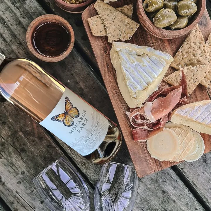 Charcuterie board with wine and cheese