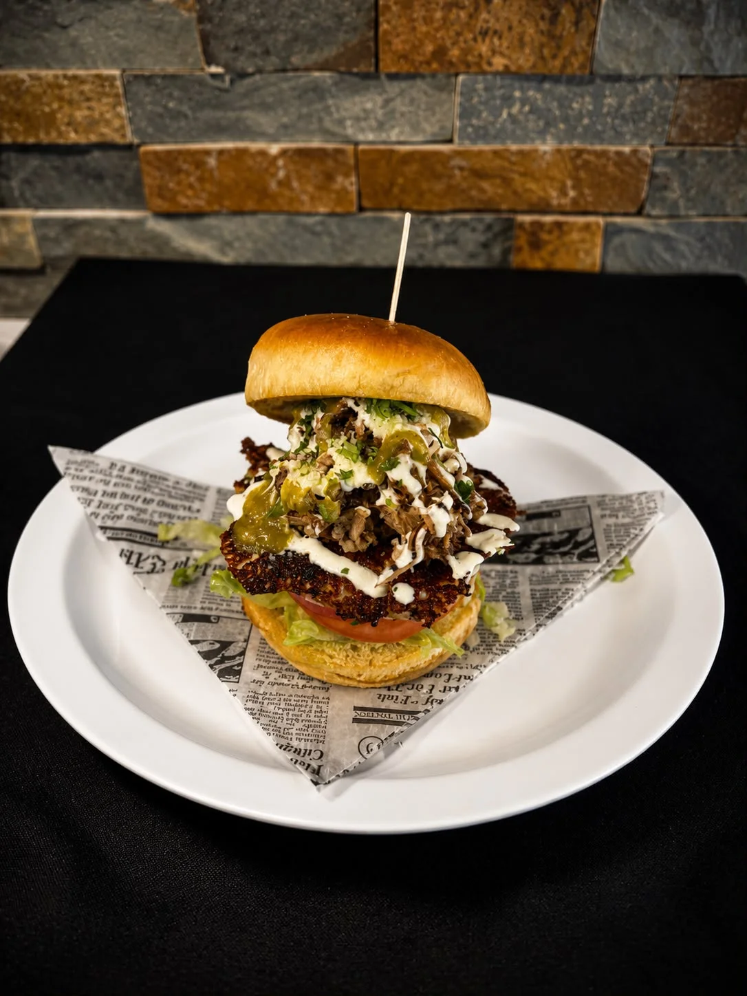 Crispy fried chicken sandwich with toppings