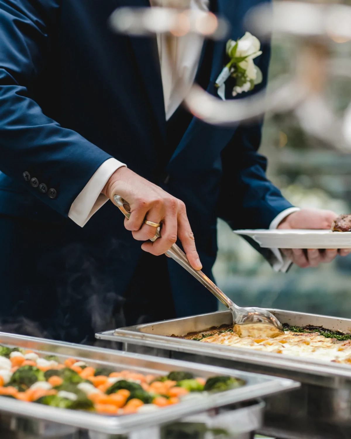 Catering service with lasagna and mixed vegetables