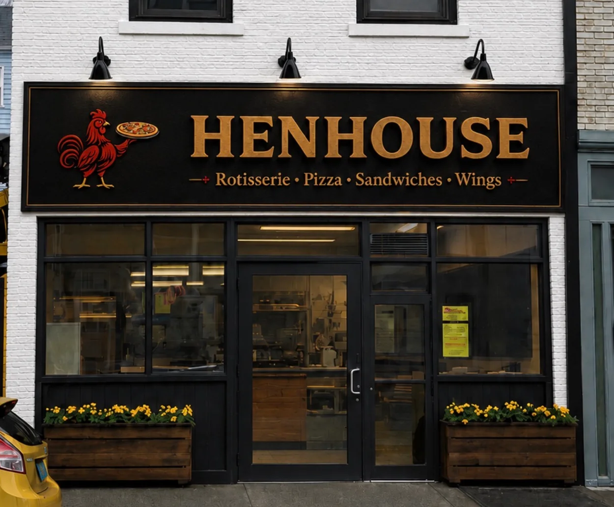 Charming restaurant exterior of Henhouse with rotisserie and pizza offerings