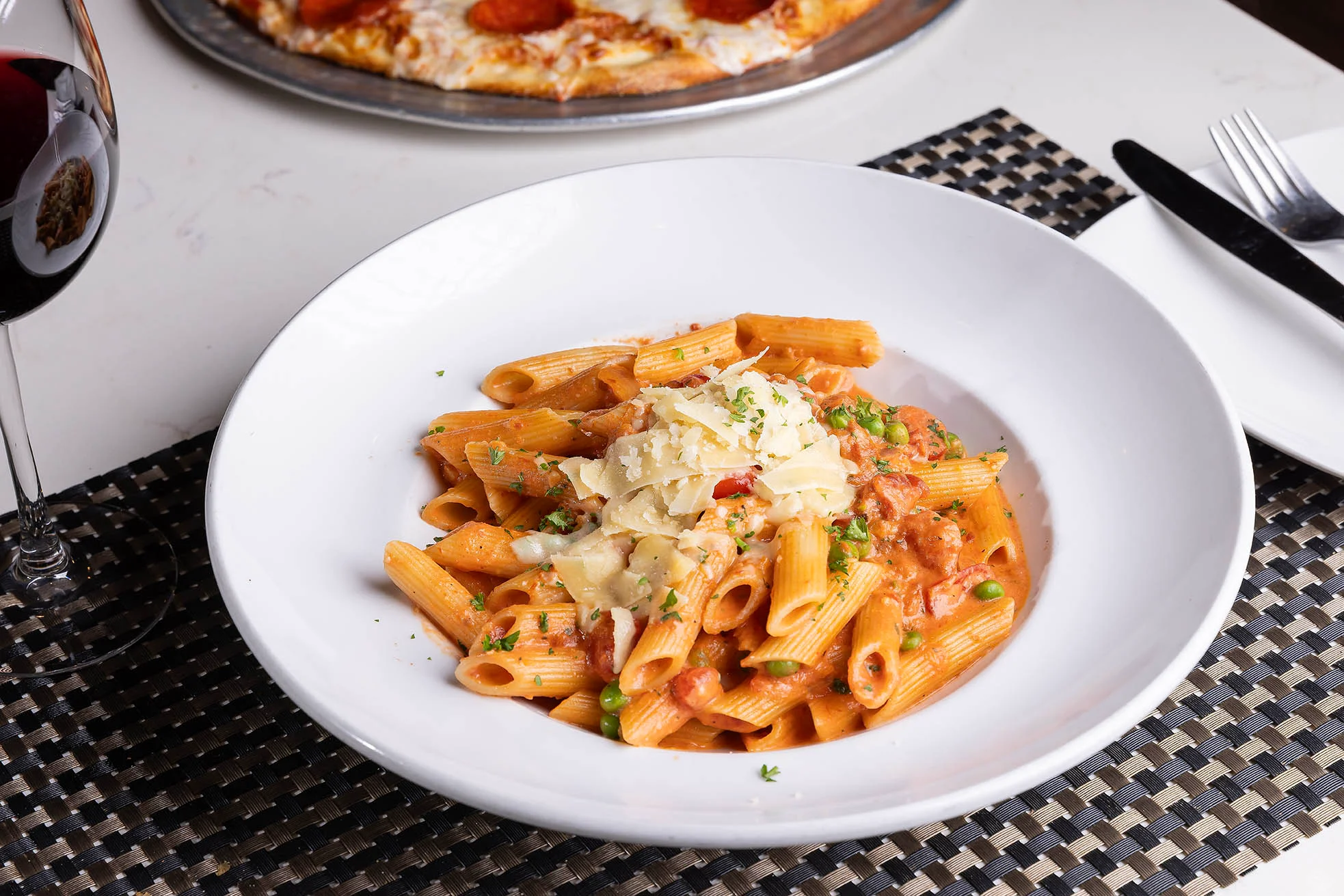 Fresh rigatoni pasta with red sauce