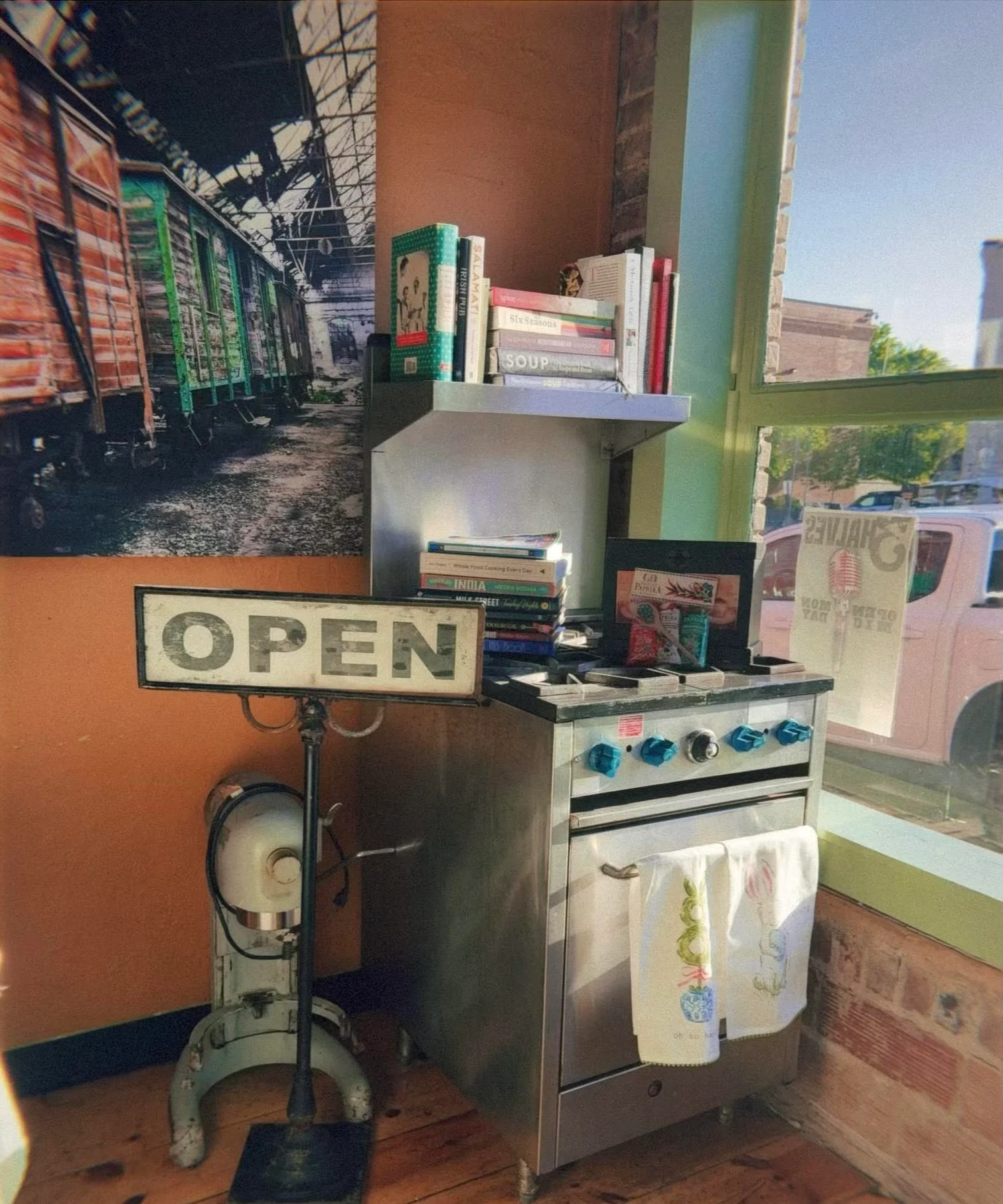 Charming restaurant corner with an open sign and vintage decor