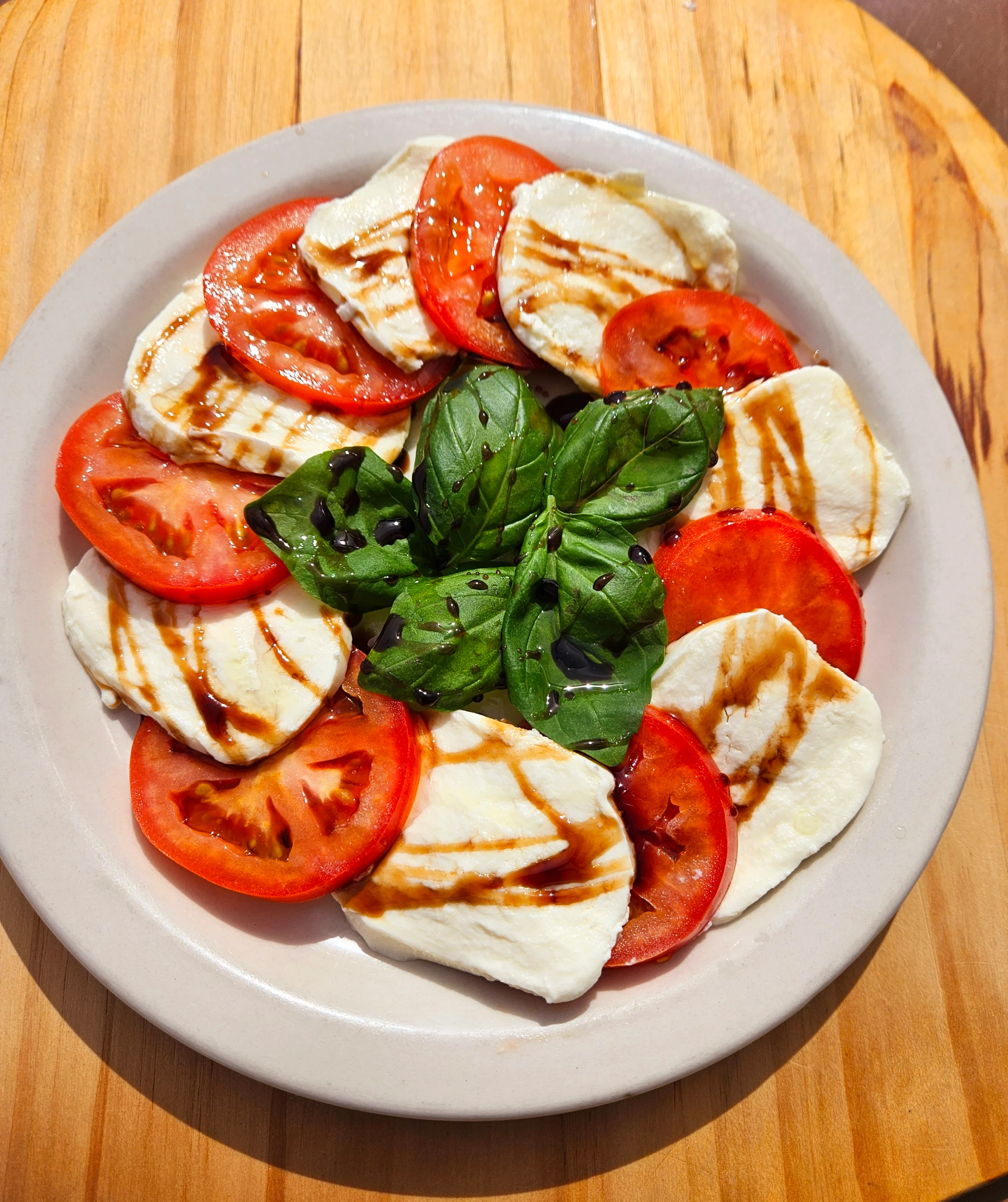 Caprese salad with fresh mozzarella, tomatoes, and basil