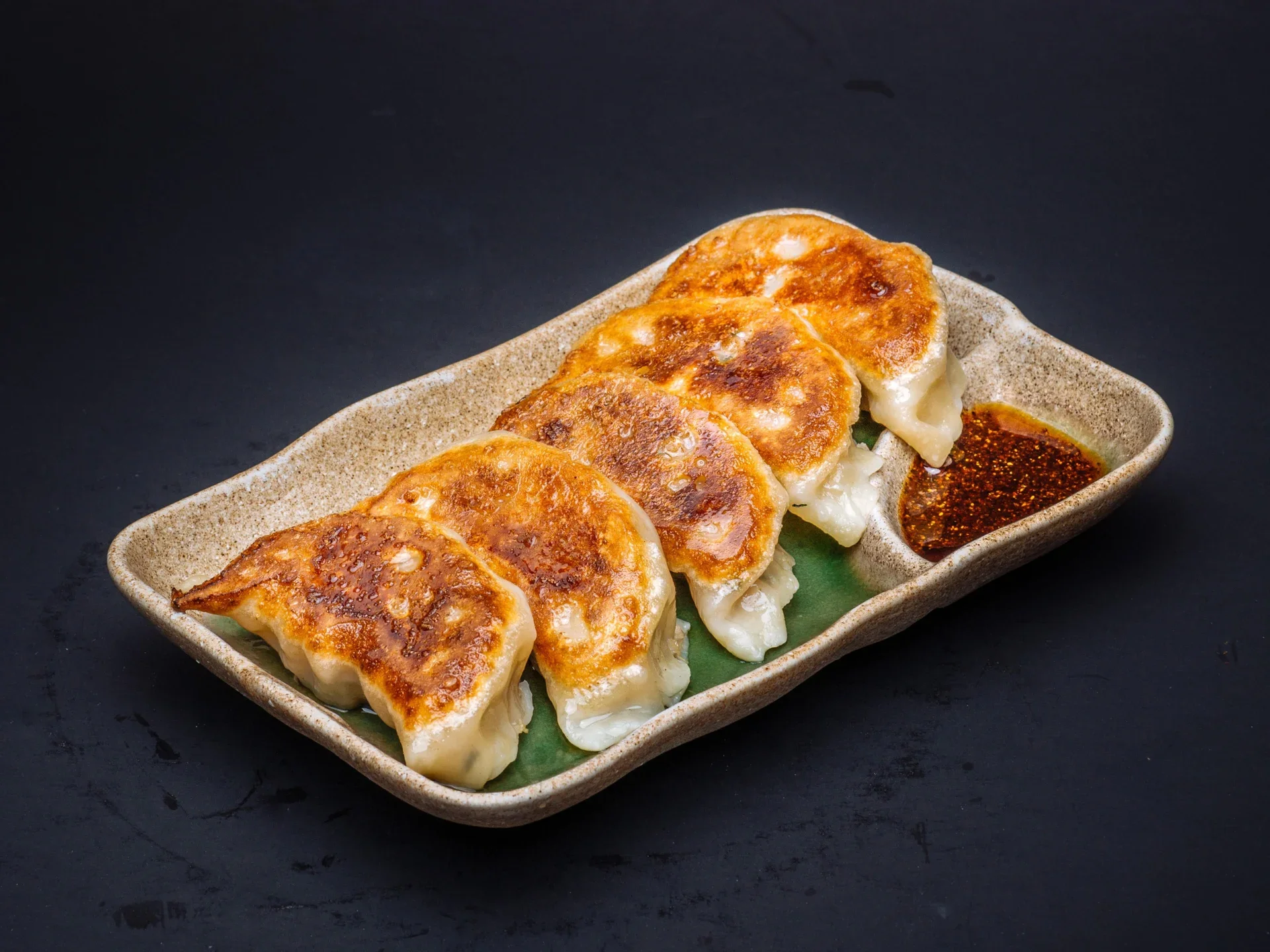 Goma Tei pan-fried gyoza with dipping sauce
