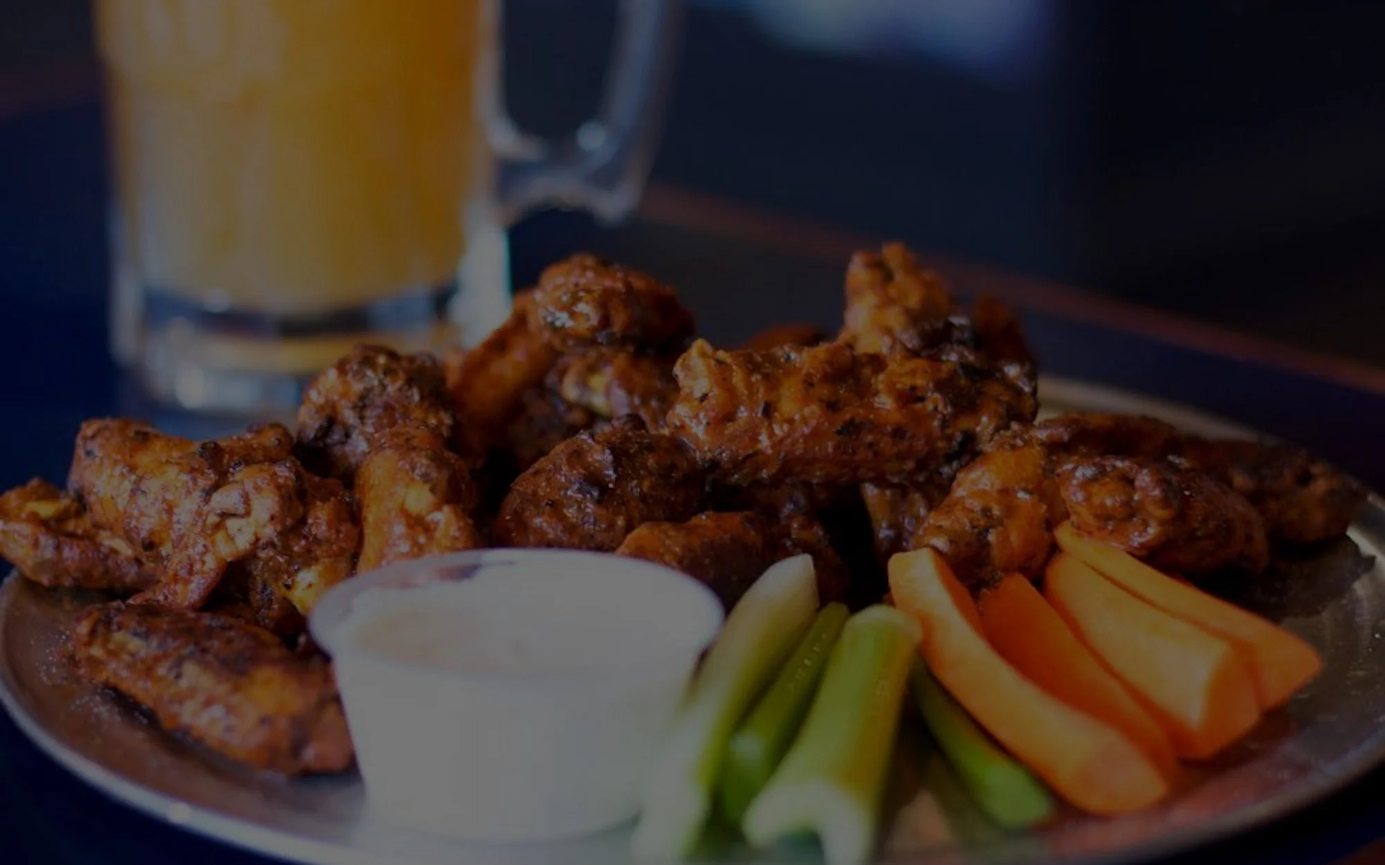 House-marinated wings and a draft beer at Stadium Pepz Pizza & Eatery near Angel Stadium