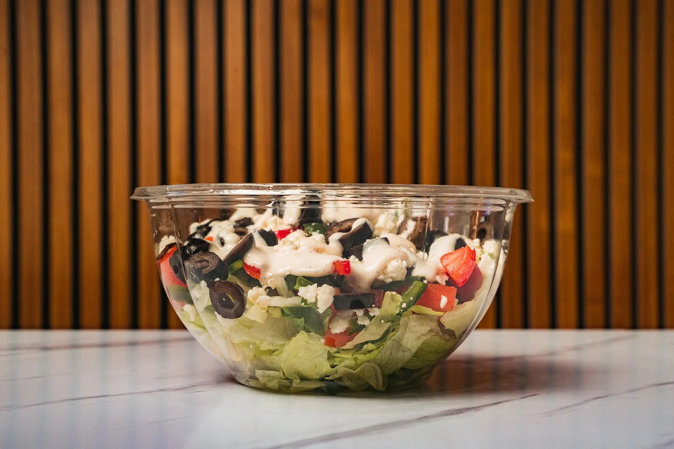 Fresh Mediterranean salad in a clear bowl