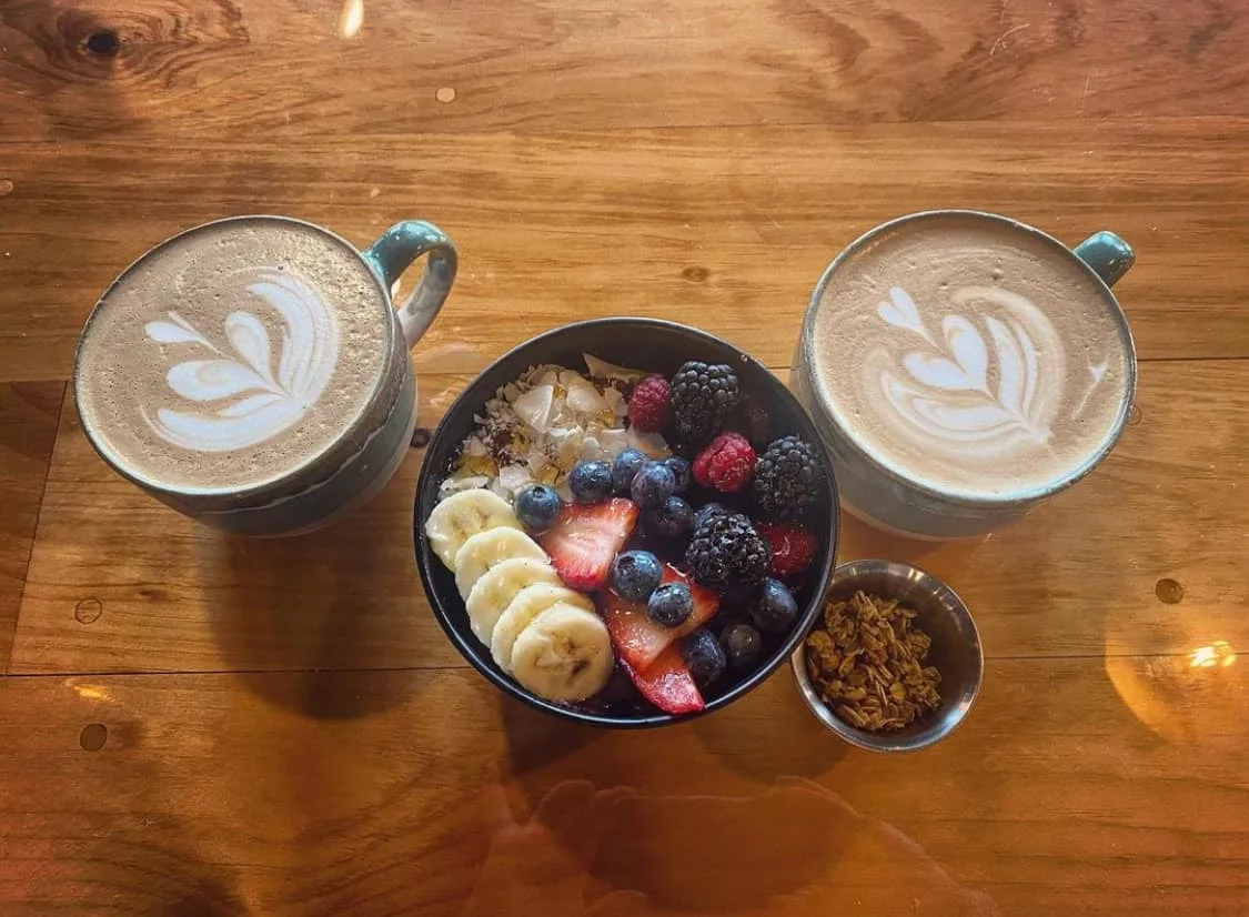 Artisan coffee and acai bowl with fresh fruits