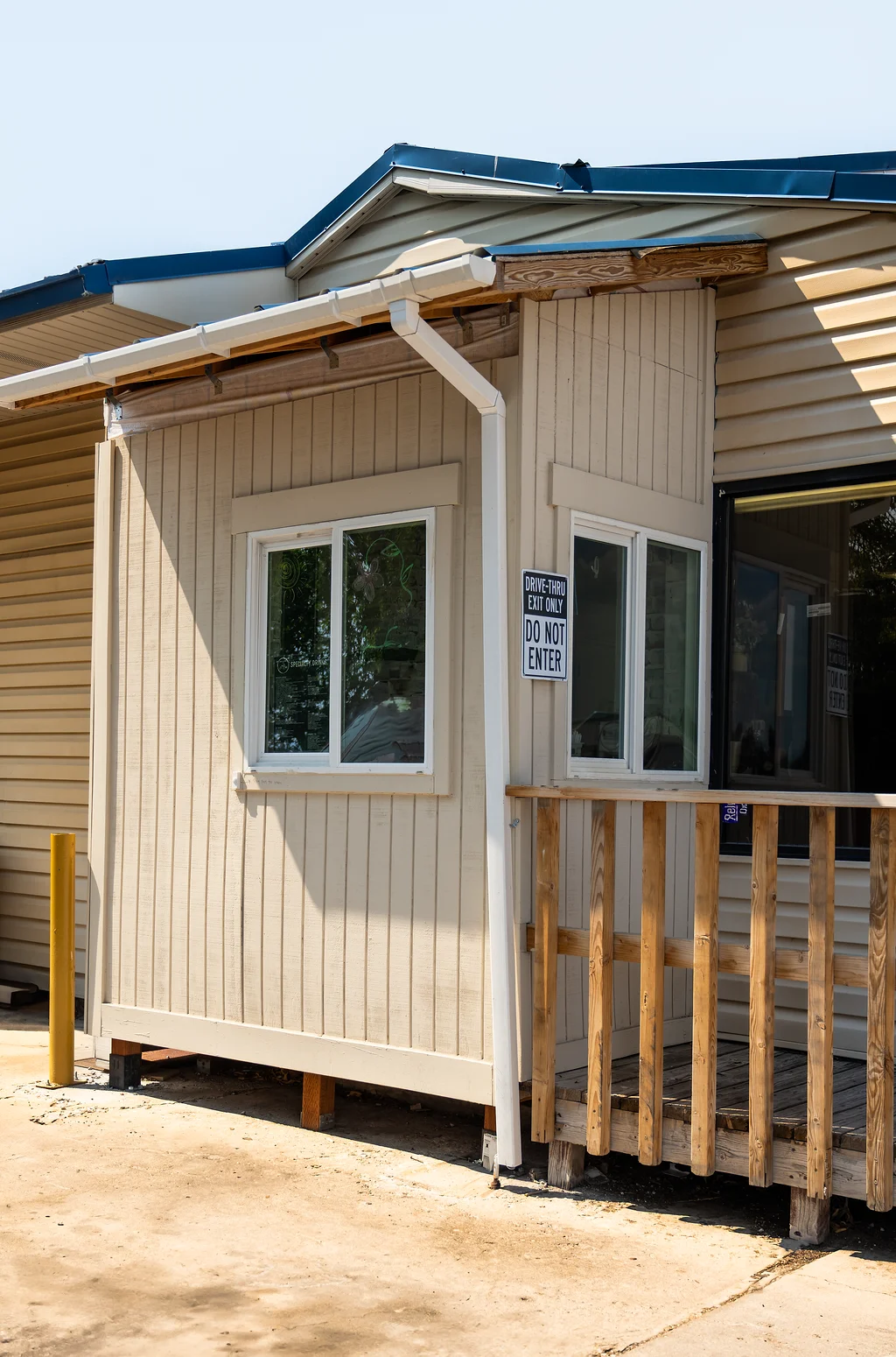 Drive-thru restaurant exterior with signage