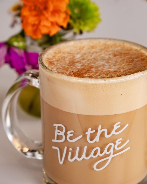 dirty pumpkin chai latte in a be the village mug